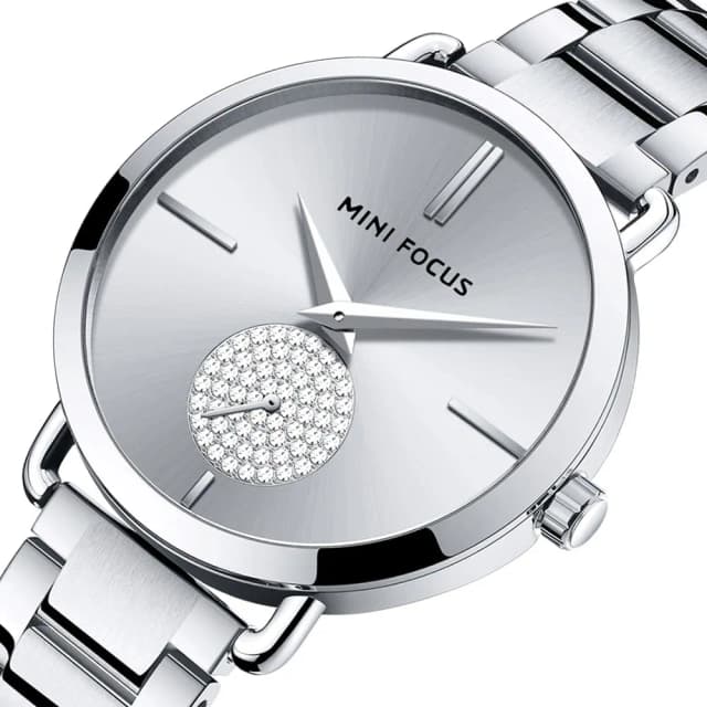 Close-up of the sparkling dial with minimalistic hour markers