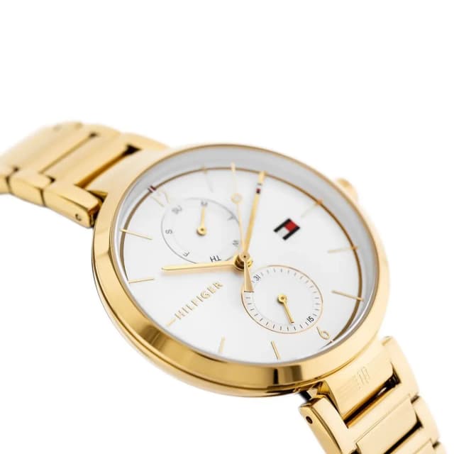Close-up of the white dial with gold-tone hands and day/date subdials